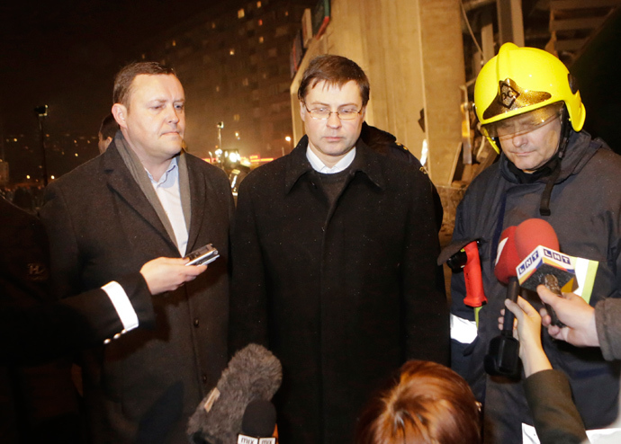 Latvia's Prime Minister Valdis Dombrovskis (C) (Reuters)