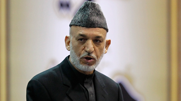 Karzai condemns US strike that killed toddler, threatens not to sign security deal