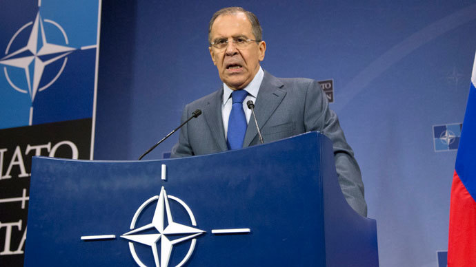 Russian Foreign Minister Sergei Lavrov gives a press conference following a meeting of Nato's Foreign Affairs minister at the organisation's headquarters in Brussels on December 4, 2013.(AFP Photo / Virginia Mayo)