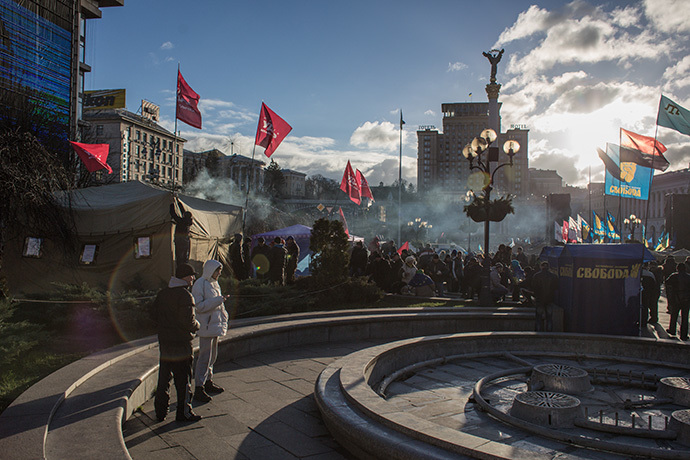 Activists stay in front of tents set up during a protest on Kievâs central square on December 2, 2013. (RIA Novosti / Andrey Stenin)