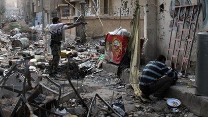 ‘Whole families murdered’: Syrian rebels execute over 80 civilians outside Damascus