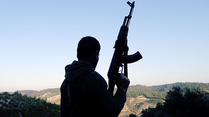 ‘Whole families murdered’: Syrian rebels execute over 80 civilians outside Damascus