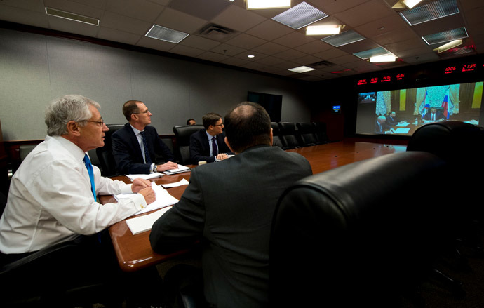 Secretary of Defense Chuck Hagel and senior defense staff meet with Russian Minister of Defense Sergey Shoygu via video (Photo from flickr.com/secdef)