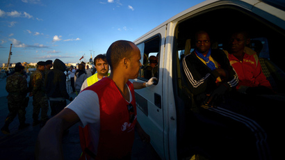 Immigrants sew mouths shut to demand release from migrant center in Italy