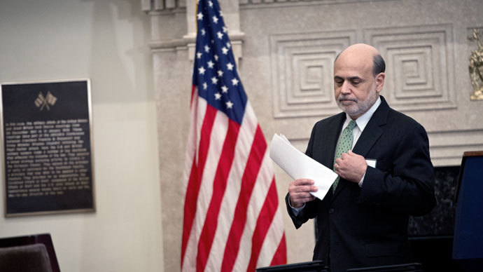 Fed reduces bond-buying program by $10 bln per month