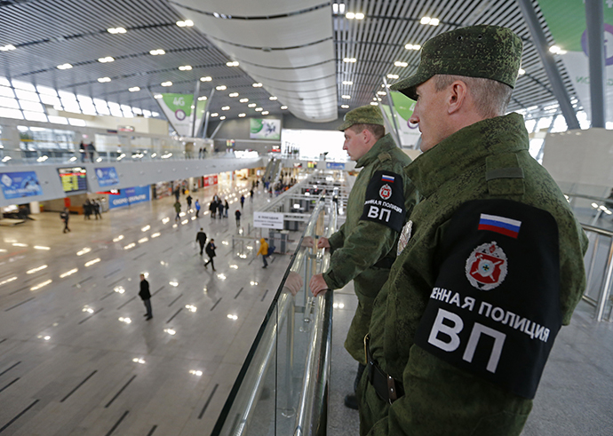 Military police officers stand guard at a train station in the Adler district of Sochi January 17, 2014. (Reuters / Alexander Demianchuk)