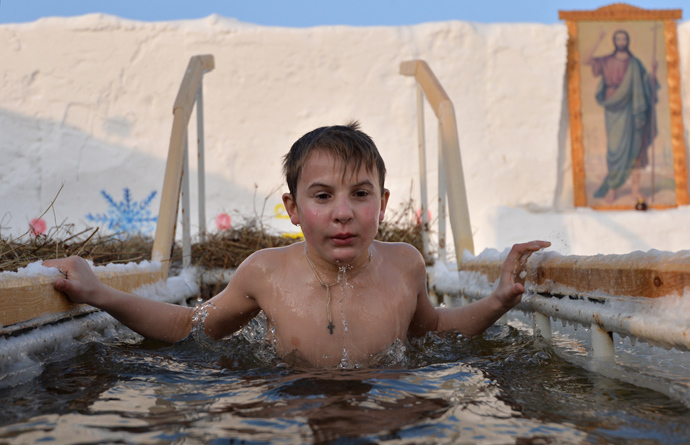 A boy dives in an ice hole during Epiphany bathing in Tobolsk. (RIA Novosti / Alexey Malgavko)