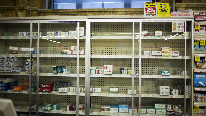CVS to stop selling tobacco products, set to lose $2 bln