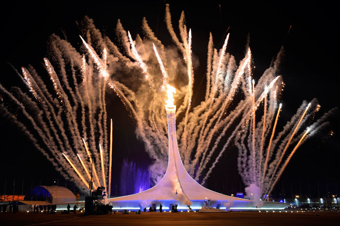 Fireworks explode behind the Olympic flame cauldron during the Opening Ceremony of the Sochi Winter Olympics on February 7, 2014 in Sochi.(AFP Photo / Odd Andersen)