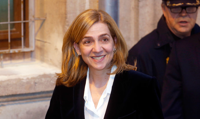 Spain's Princess Cristina, daughter of King Juan Carlos, leaves a courthouse after testifying in front of judge Jose Castro over tax fraud and money-laundering charges in Palma de Mallorca February 8, 2014 (Reuters / Albert Gea)