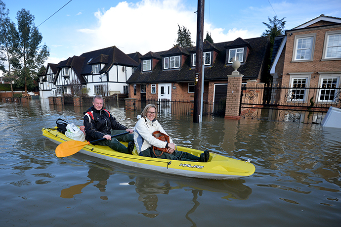 ‘Biblical flooding’ spreads across UK in worst rainfall in over 200 ...