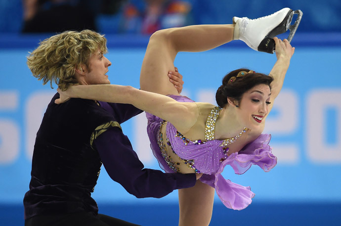 US Charlie White and US Meryl Davis compete in the Figure Skating Ice Dance Free Dance at the Iceberg Skating Palace during the Sochi Winter Olympics on February 17, 2014. (AFP Photo / Damien Meyer)