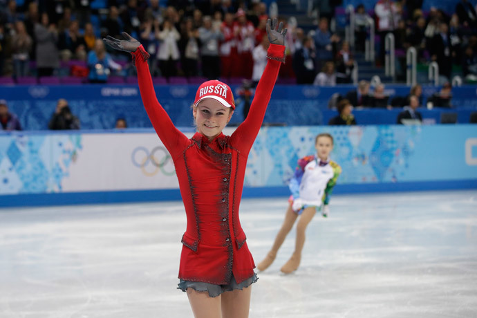 Russia's Julia Lipnitskaia waves after performing in the Women's Figure Skating Team Free Program at the Iceberg Skating Palace during the Sochi Winter Olympics on February 9, 2014. (AFP Photo Pool / Darron Cummings)