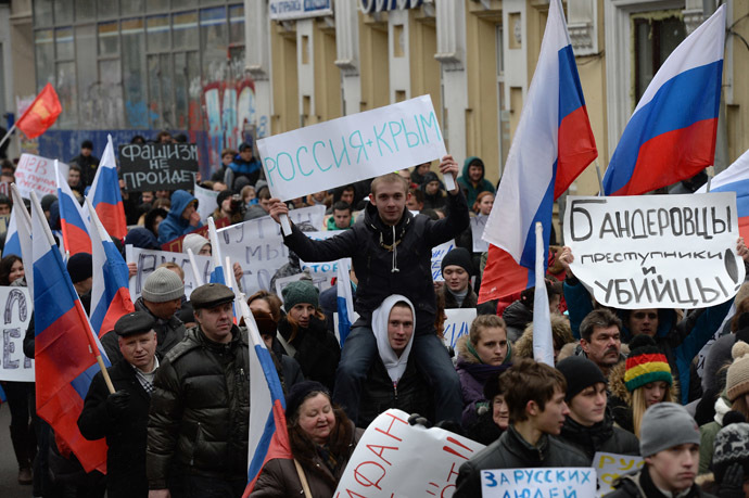 A Moscow rally in support of Russian-speakers in Ukraine. âRussia + Crimea,â âBandera followers are criminals and murderers,â and âFascism wonât pass.â (RIA Novosti/Maksim Blinov)