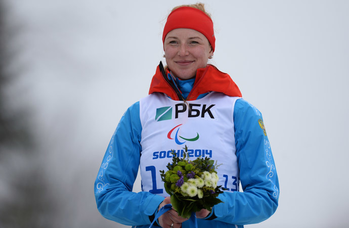 Russiaâs Alena Kaufman after winning gold in the womenâs 10 kilometers standing event at the Sochi Paralympics. (RIA Novosti / Maxim Bogodvid)