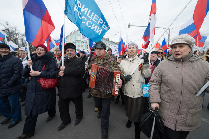 Participants in the "Brotherhood and Civilan Resistance March" rally during procession with slogans "Against Maidan!" and "No Way for Fascism." (AFP Photo/Dmitry Serebryakov)