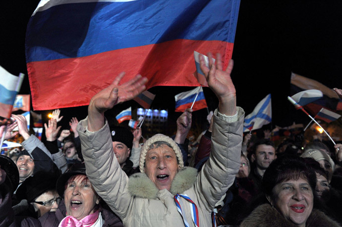 Pro-Russian Crimeans celebrate in Sevastopol on March 16, 2014 after partial showed that about 95.5 percent of voters in Ukraine's Crimea region supported union with Russia.(AFP Photo / Viktor Drachev)