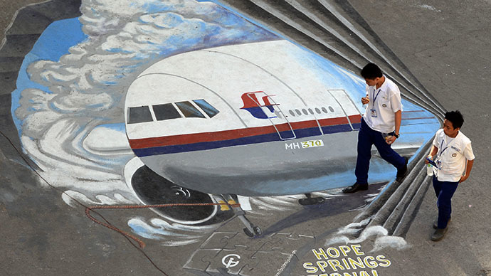 Missing Malaysia Airlines plane was programmed to divert just before signoff – report