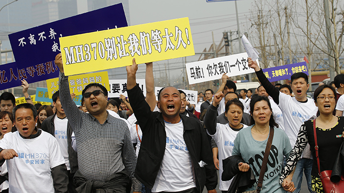 'Have you no shame?' Grief-stricken families of MH370 passengers protest in China