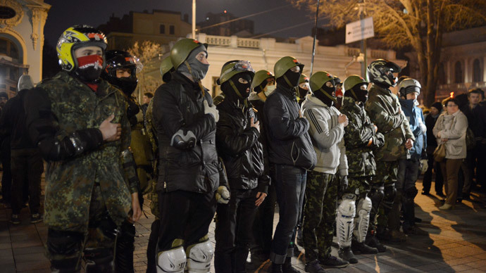 Activists of the Right Sector movement and their supporters gather outside the parliament building to demand the immediate resignation of Internal Affairs Minister Arsen Avakov, in Kiev March 27, 2014.(Reuters / Maks Levin)