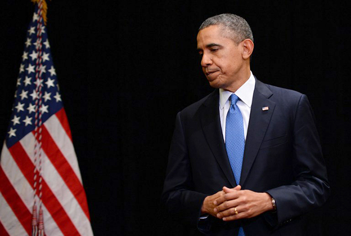 US President Barack Obama departs after making a statement to the press on April 2, 2014 in Chicago, Illinois, on the shooting at the Fort Hood military base in Texas. (AFP Photo / Jewel Samad)
