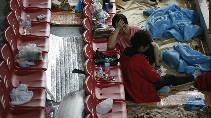 Death toll in S. Korean ferry disaster rises to 64 as divers find more bodies