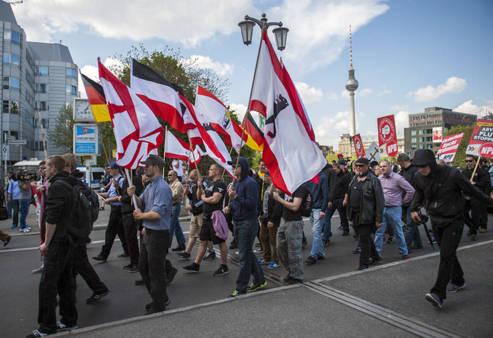 Activists from the far right party NPD march across the Jannowitz bridge in Berlin on April 26, 2014. (AFP Photo/Odd Andersen)