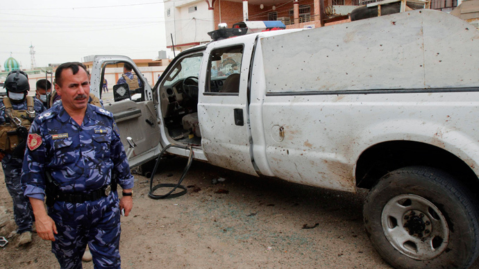 Suicide bombers kill at least 50 across Iraq ahead of general election