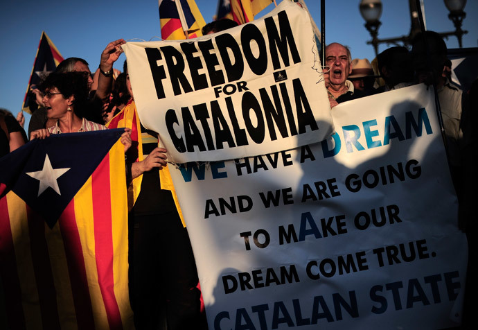 Demonstrators take part in a protest as part of a campaign for independence from Spain, at the Pedralbes Palace in Barcelona (AFP Photo / Josep Lago)