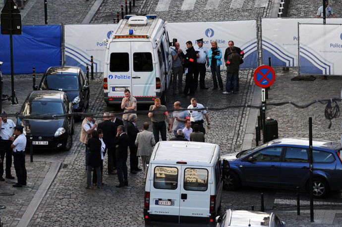 Police personnel are seen at the site of a shooting in central Brussels May 24, 2014. (Reuters / Eric Vidal)