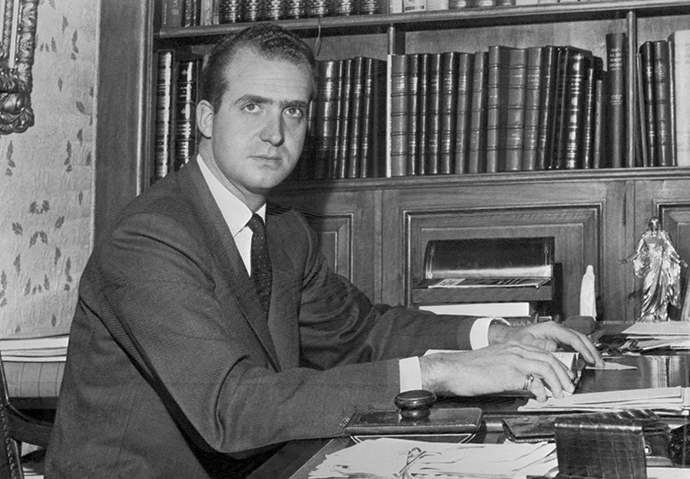 Prince Juan Carlos of Spain (Juan Carlos Alfonso VÃctor MarÃa de Borbón y Borbón) pictured at his desk in November 1975 in Madrid (AFP Photo)