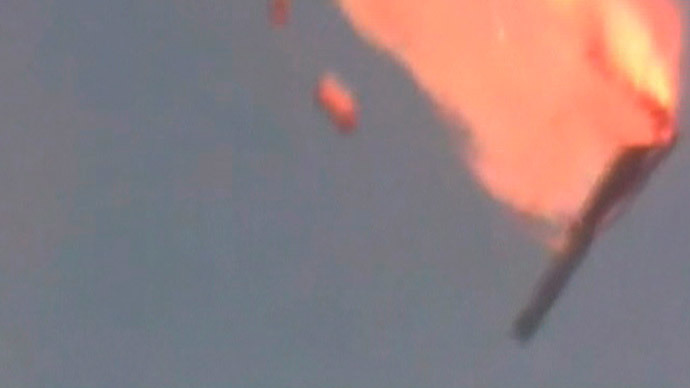 A still frame taken from a video shows an unmanned Russian Proton-M booster rocket as it falls apart after launch, in Baikonur July 2, 2013.(Reuters / Pool via Reuters TV)