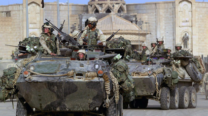 U.S. Marines of the 1st LAR based in Camp Pendleton, California occupy Saddam Hussein's presidential palace in the northern Iraq town of Tikrit April 14, 2003. (Reuters)