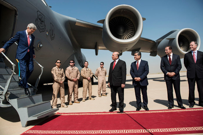 U.S. Secretary of State John Kerry (L) arrives in Arbil, the capital of northern Iraq's Kurdistan autonomous region, June 24, 2014.(Reuters / Brendan Smialowski / Pool)