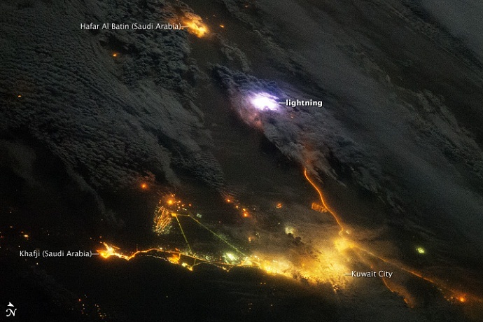 A white flash of lightning above Kuwait and Saudi Arabia, as seen from the International Space Station on December 12, 2013 (Image from earthobservatory.nasa.gov)