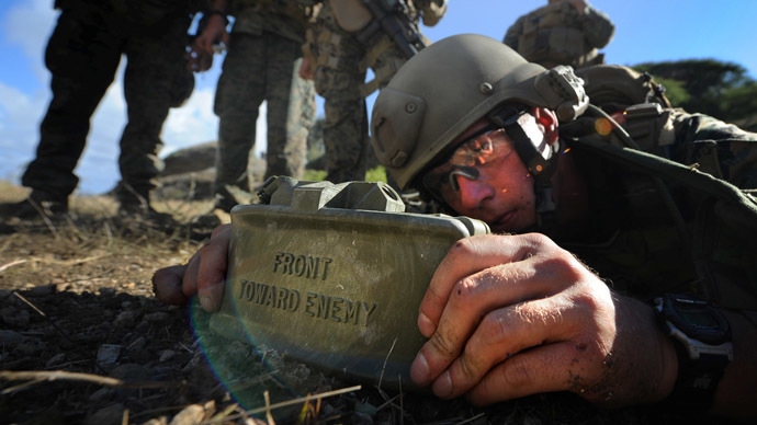 A US Marine emplaces a Claymore mine (Image from Wikipedia.org)