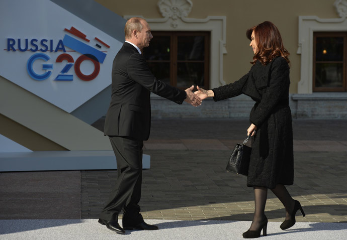 Russiaâs President Vladimir Putin (L) welcomes Argentinaâs President Cristina Fernandez de Kirchner at the start of the G20 summit on September 5, 2013 in Saint Petersburg.(AFP Photo / Eric Feferberg)