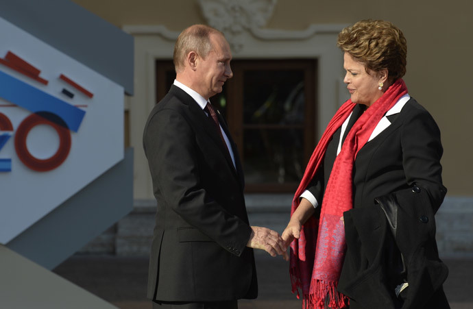 Russiaâs President Vladimir Putin (L) welcomes Brazilâs President Dilma Rousseff at the start of the G20 summit on September 5, 2013 in Saint Petersburg.(AFP Photo / Eric Feferberg)