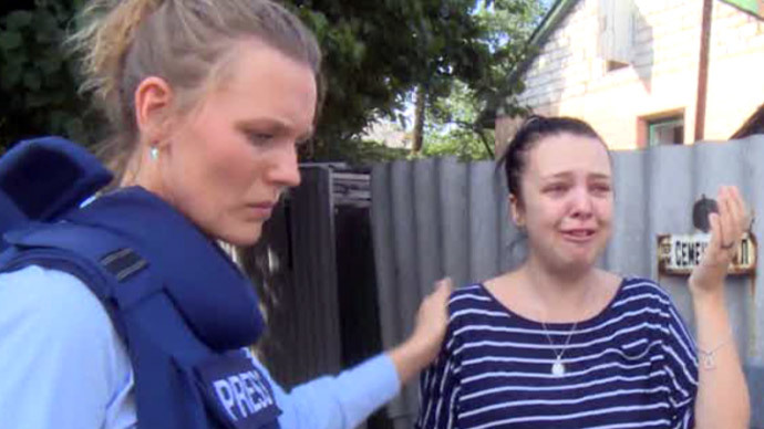 Screenshot from RT video / RTâs Maria Finoshina talks to a girl whose mother was wounded in shelling by Kievâs troops in Lugansk, Eastern Ukraine