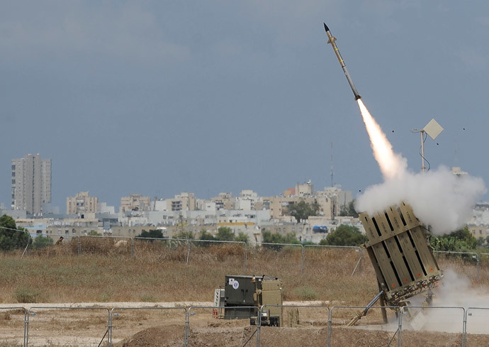 A missile is launched by an "Iron Dome" battery, a short-range missile defence system designed to intercept and destroy incoming short-range rockets and artillery shells, on July 15, 2014 in the southern Israeli city of Ashdod. (AFP Photo / David Buimovitch)