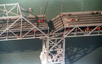 A collapsed portion of the Oakland Bay Bridge after an earthquake rocked northern California on Oct. 7, 1989. (AFP Photo / Gary Weber)