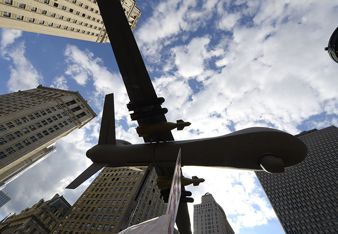 A model of a drone on display as New Yorkers gather to protest IsraelÃs military assault in Gaza during a rally at Foley Square July 24, 2014 where they will read aloud over hundred names of the Palestinian children that killed in IsraelÃs assault, before march through lower Manhattan. (AFP Photo / Timothy A. Clary)