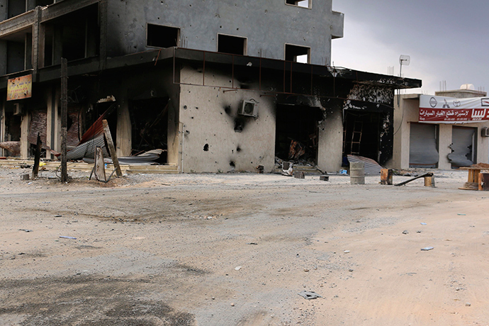 A damaged building is pictured after clashes between rival militias, in an area at Alswani road in Tripoli July 28, 2014 (Reuters / Hani Amara)