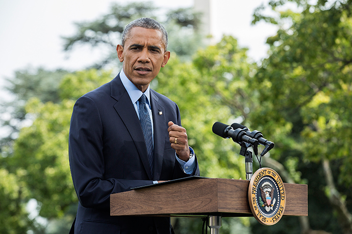 U.S. President Barack Obama speaks about new sanctions imposed on Russia as he departs the White House in Washington July 29, 2014 (Reuters / Joshua Roberts)