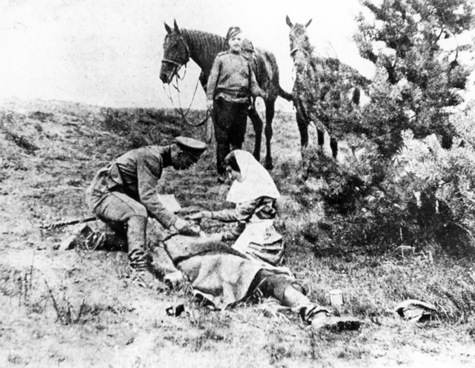 Reproduction of the photo from Russian Illustration magazine (No. 31, 1915) from the funds of the Military and Medical Museum in Leningrad (St. Petersburg currently). The first aid at the battle field during the World War I of 1914-1918. (RIA Novosti)