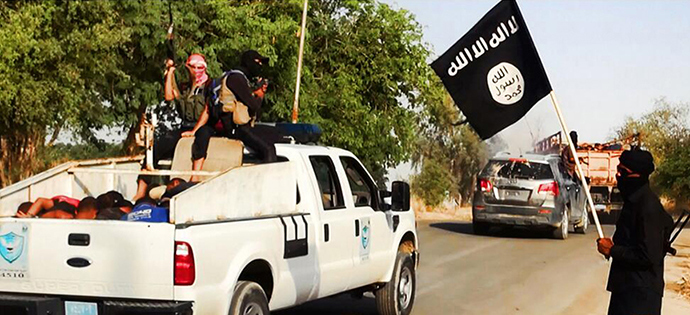 An image uploaded on June 14, 2014 on the jihadist website Welayat Salahuddin allegedly shows militants of the Islamic State of Iraq and the Levant (ISIS) (AFP Photo)