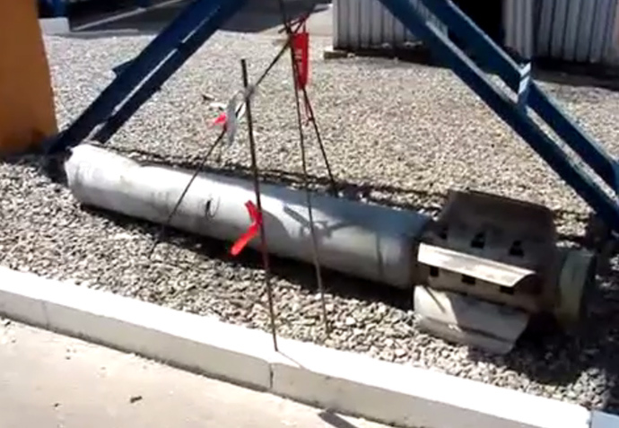 A still from YouTube video by SputnikTV allegedly showing remains of a shell at the territory of Gorlovka chemical plant in eastern Ukraine