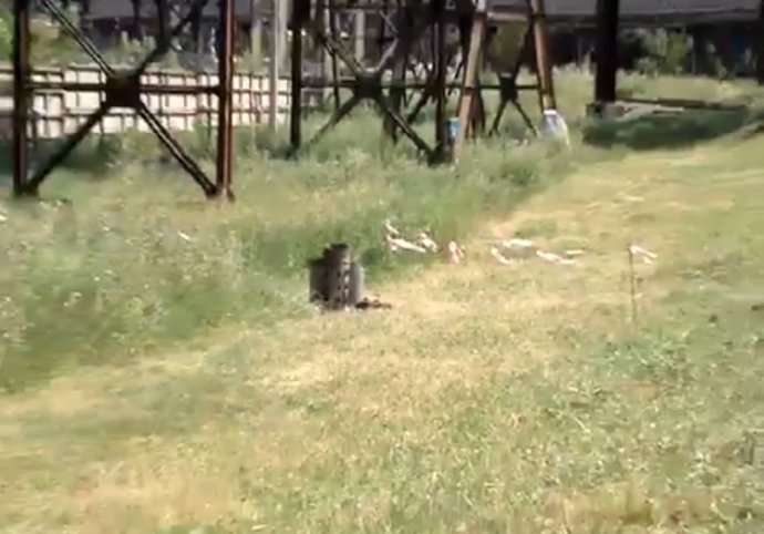 A still from YouTube video by SputnikTV allegedly shows remains of a shell near the facilities of Gorlovka chemical plant in eastern Ukraine