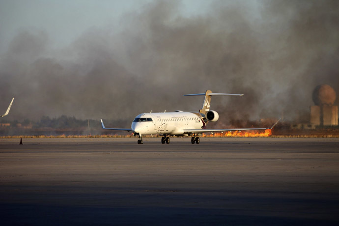 Smoke rises after a shelling at Tripoli International Airport July 15, 2014. (Reuters/Hani Amara)