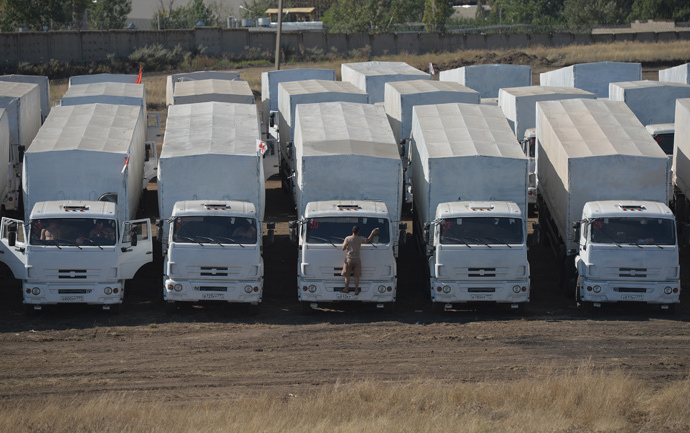 A convoy of Kamaz trucks carrying humanitarian aid for people in southeastern Ukraine in a rest area not far from Kamensk-Shakhtinsky in the Rostov Region. (RIA Novosti / Maksim Blinov)